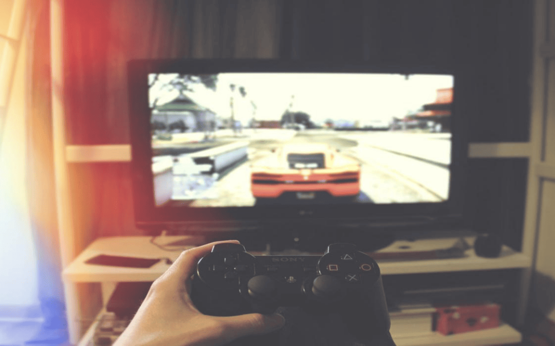 A hand holding a controller playing a racing game with a color of nostalgia